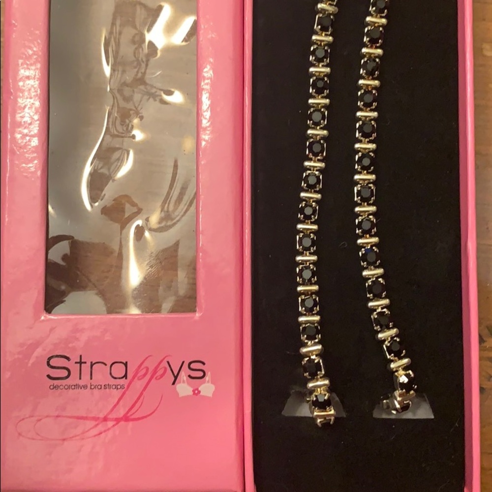 Strappy’s black rhinestone bra straps
